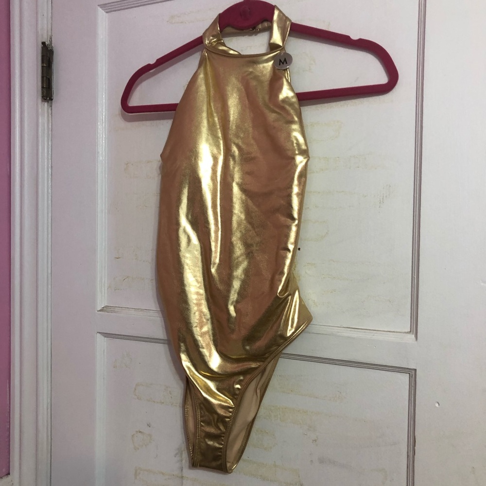 Gold metallic body suit